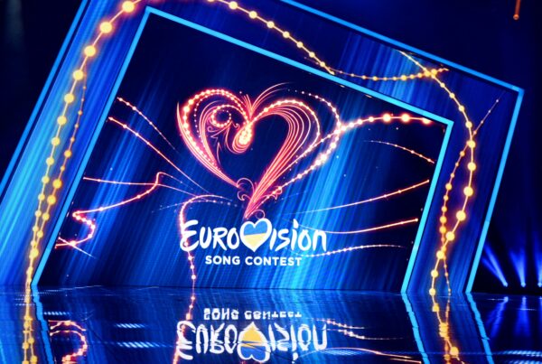 Eurovision song contest stage featuring Ukranian flag filling up the letter 'V'